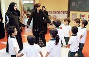 Akie Abe, wife of Japanese Prime Minister Shinzo Abe, 2nd left back, dances with kindergarten students at the King Faisal school in Ryadh, Saudi Arabia, Saturday, April 28, 2007. AP Photo/Kazuyuki Tamakami, Japan Pool)